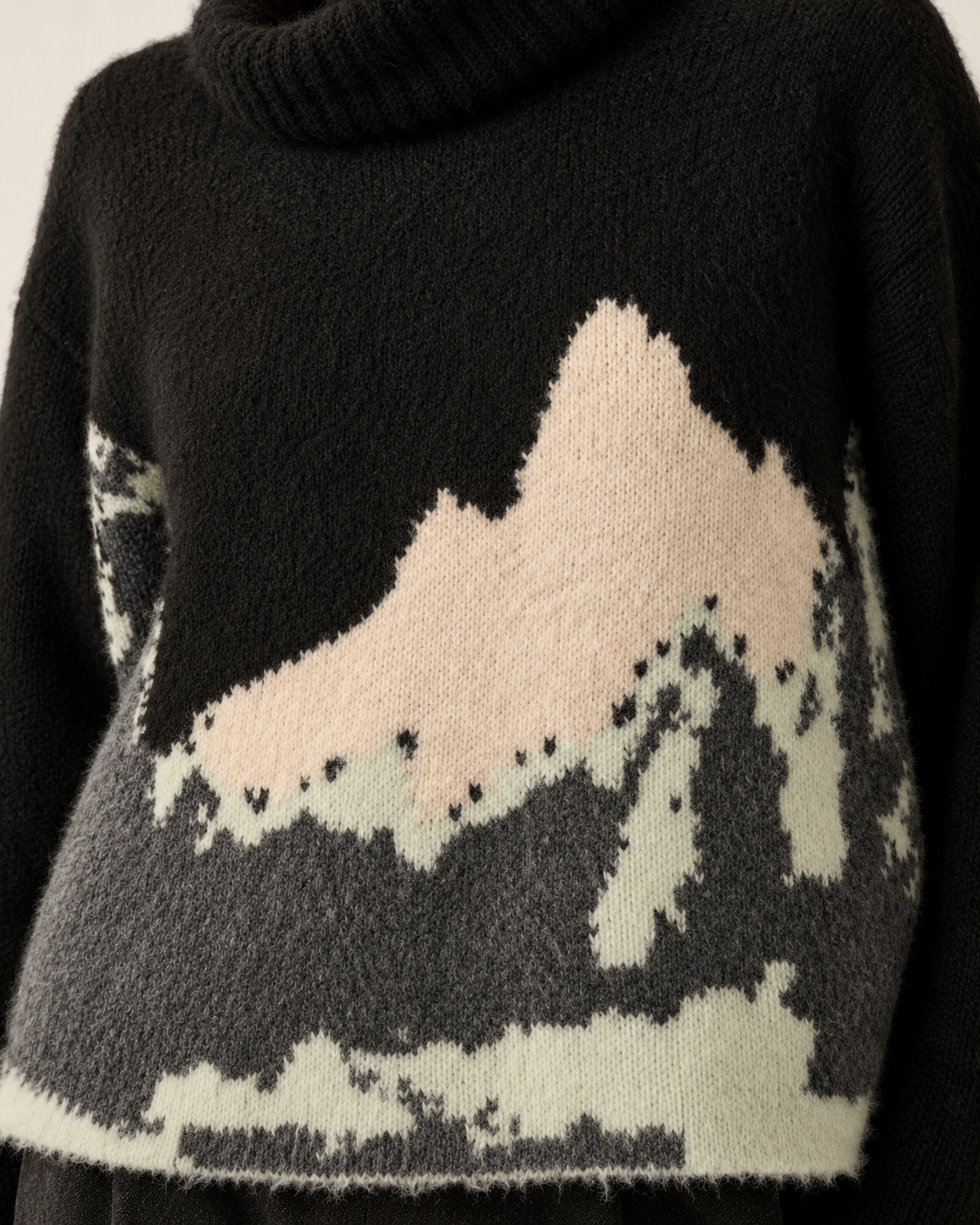 Black mountain landscape turtleneck sweater knit detail