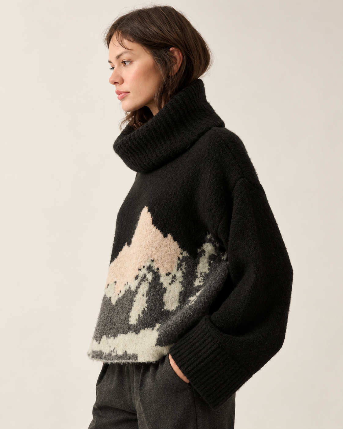 Black mountain landscape turtleneck sweater profile view